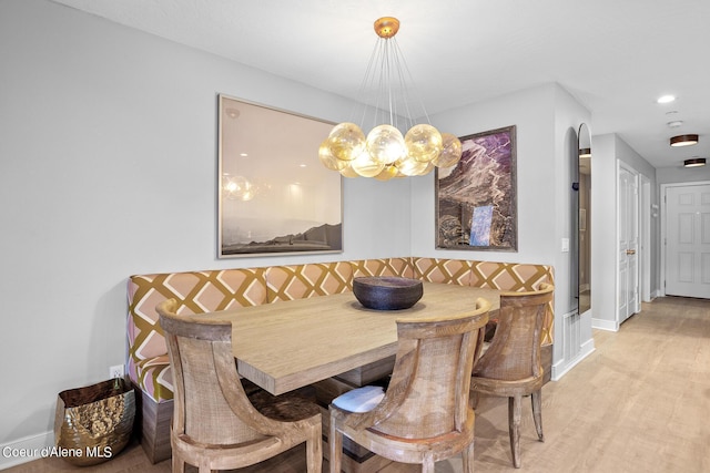 4797 S Arrow Point Dr # 102, Harrison, ID 83833 - dining space with baseboards, light wood-style flooring, and recessed lighting