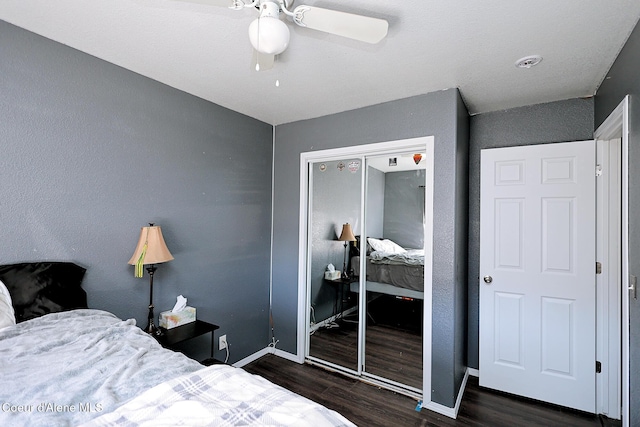 8102 W Arizona St, Rathdrum, ID 83858 - bedroom with dark wood-type flooring, a closet, and ceiling fan