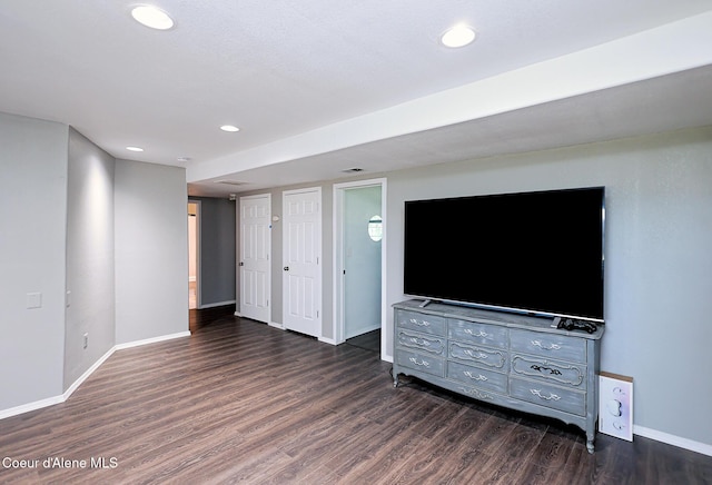 8102 W Arizona St, Rathdrum, ID 83858 - unfurnished living room featuring wood finished floors and recessed lighting