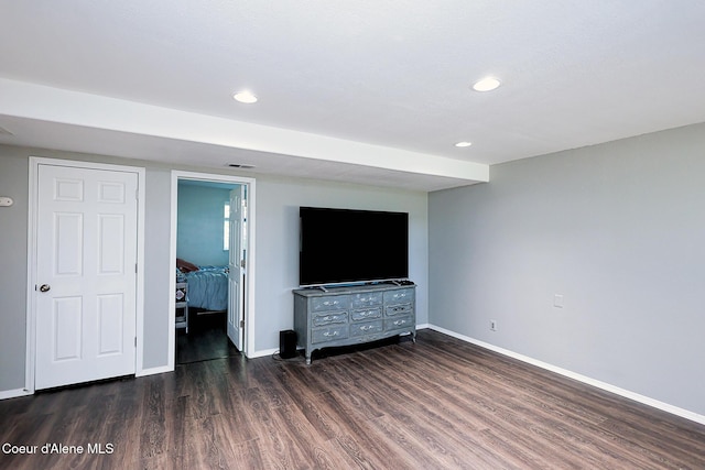 8102 W Arizona St, Rathdrum, ID 83858 - unfurnished living room featuring wood finished floors and recessed lighting