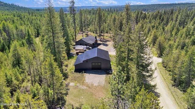 aerial view with a wooded view