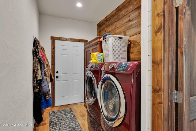 laundry room with recessed lighting, laundry area, and washing machine and clothes dryer