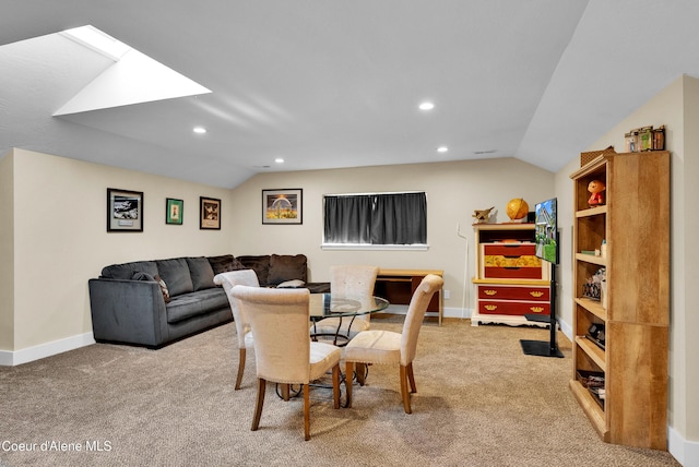 1315 N 10th St, Coeur Dalene, ID 83814 - carpeted dining space featuring vaulted ceiling, recessed lighting, baseboards, and a skylight