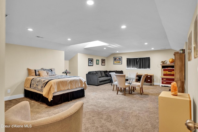 1315 N 10th St, Coeur Dalene, ID 83814 - bedroom with light carpet, recessed lighting, vaulted ceiling, baseboards, and a skylight
