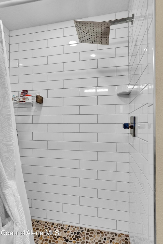 1315 N 10th St, Coeur Dalene, ID 83814 - bathroom featuring a tile shower