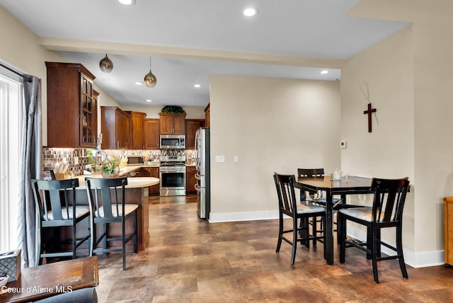 1315 N 10th St, Coeur Dalene, ID 83814 - dining area featuring baseboards and recessed lighting