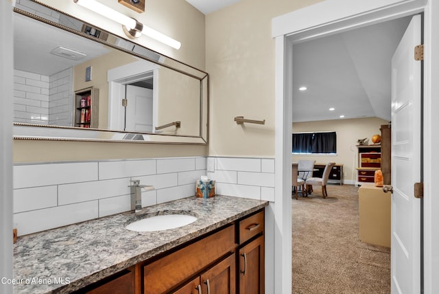 1315 N 10th St, Coeur Dalene, ID 83814 - bathroom with vanity, decorative backsplash, and recessed lighting