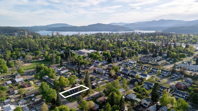 1315 N 10th St, Coeur Dalene, ID 83814 - aerial view of property's location featuring property parcel outlined and a water and mountain view