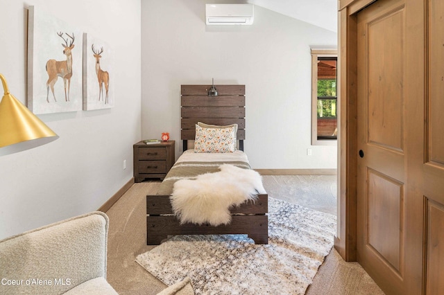 carpeted bedroom with baseboards, a wall unit AC, and vaulted ceiling