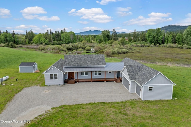 view of subject property with mountains