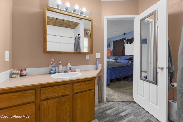 1729 N 9th St, Coeur Dalene, ID 83814 - ensuite bathroom featuring vanity and wood finished floors