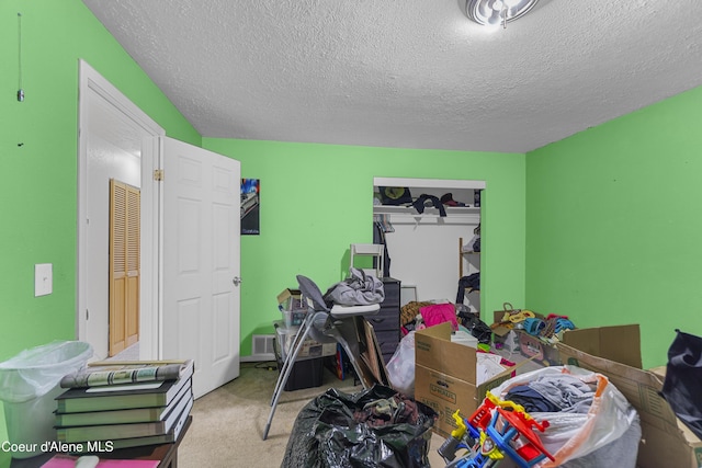 1729 N 9th St, Coeur Dalene, ID 83814 - carpeted bedroom featuring a textured ceiling and a closet
