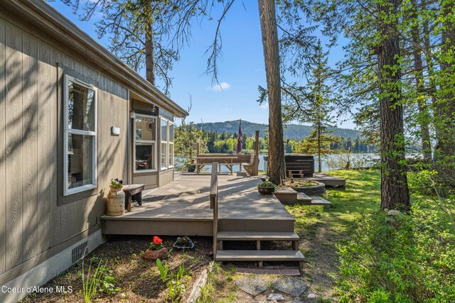 wooden terrace featuring a mountain view