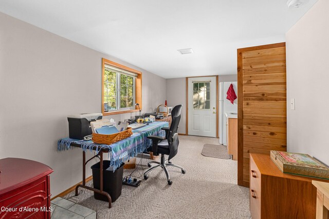 office space with carpet floors and baseboards
