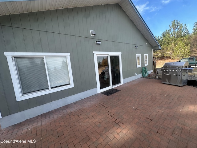 10320 N Payment Peak Rd, Hauser, ID 83854 - rear view of house featuring a patio