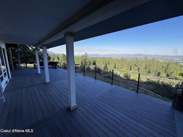 10320 N Payment Peak Rd, Hauser, ID 83854 - deck with a forest view