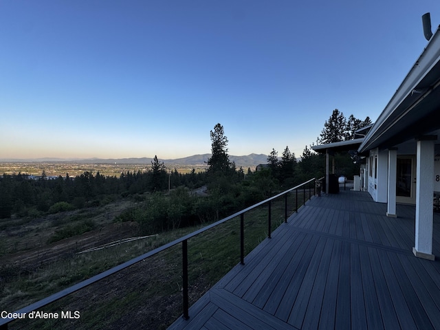 10320 N Payment Peak Rd, Hauser, ID 83854 - deck featuring a mountain view