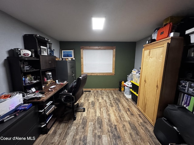 10320 N Payment Peak Rd, Hauser, ID 83854 - home office with wood finished floors