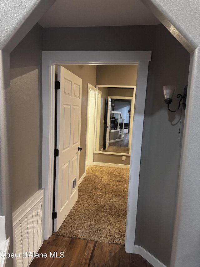 10320 N Payment Peak Rd, Hauser, ID 83854 - hall featuring wood finished floors