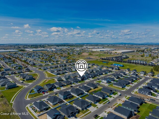 7102 S Hever St, Cheney, WA 99004 - aerial view of property and surrounding area with nearby suburban area