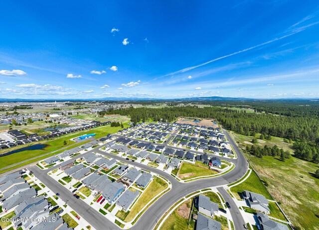 7102 S Hever St, Cheney, WA 99004 - aerial view of residential area with a heavily wooded area