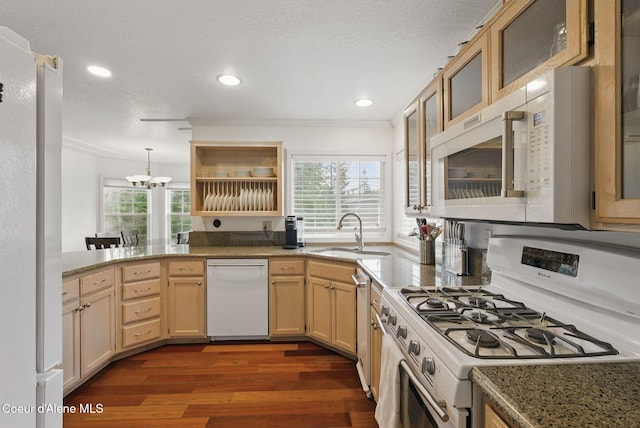 2123 Browning Way, Sandpoint, ID 83864 - kitchen featuring an inviting chandelier, a sink, dark wood-style floors, white appliances, and recessed lighting