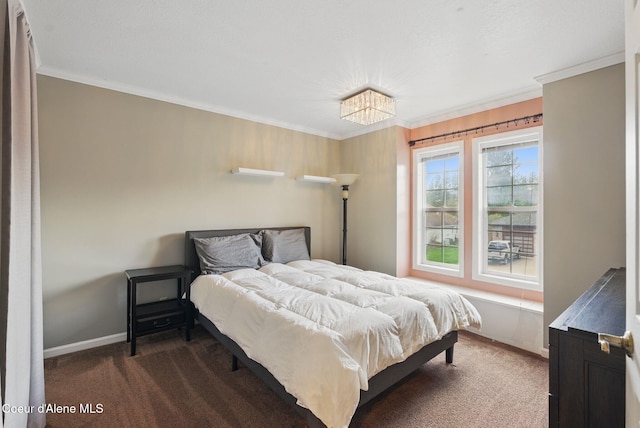 2123 Browning Way, Sandpoint, ID 83864 - bedroom featuring baseboards, dark colored carpet, and crown molding