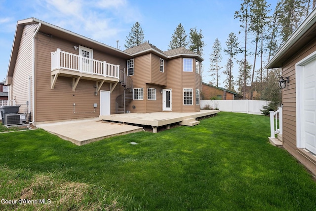 2123 Browning Way, Sandpoint, ID 83864 - back of house with a yard, a balcony, fence, a patio area, and a deck