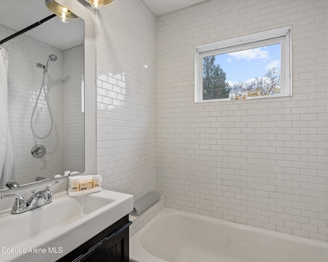 bathroom with shower / tub combo with curtain and vanity