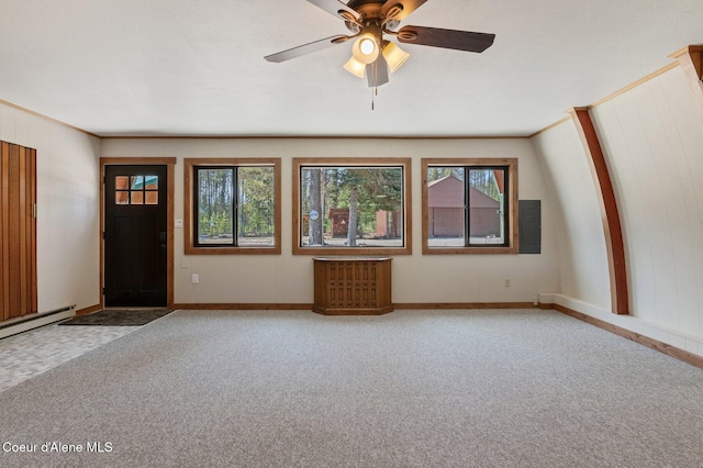 762 Reeder Bay Rd, Nordman, ID 83848 - unfurnished living room with carpet floors, healthy amount of natural light, and a baseboard heating unit