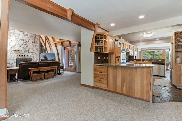762 Reeder Bay Rd, Nordman, ID 83848 - kitchen featuring stainless steel appliances, open shelves, carpet, dark stone counters, and a sink