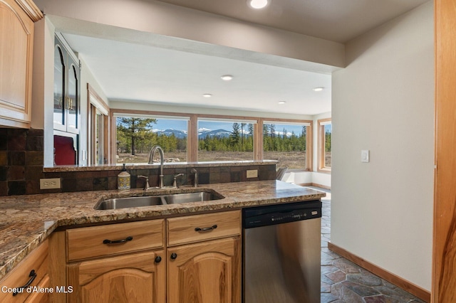 762 Reeder Bay Rd, Nordman, ID 83848 - kitchen with dishwasher, a sink, baseboards, stone countertops, and recessed lighting