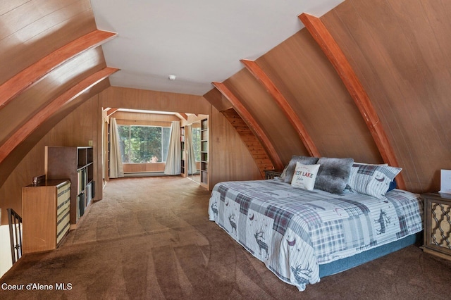 762 Reeder Bay Rd, Nordman, ID 83848 - carpeted bedroom with wood walls and lofted ceiling