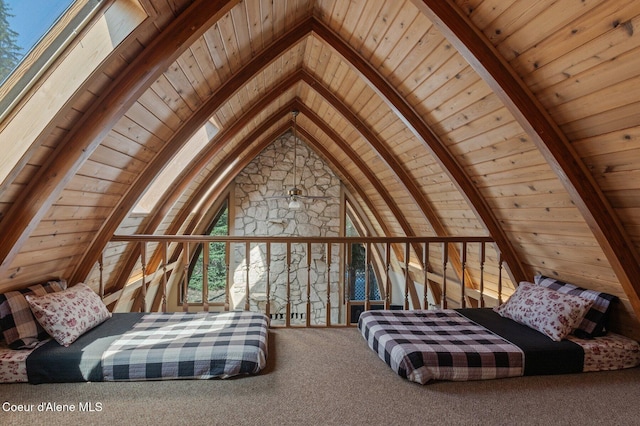 762 Reeder Bay Rd, Nordman, ID 83848 - bedroom with wood ceiling and carpet flooring