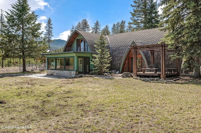 762 Reeder Bay Rd, Nordman, ID 83848 - rear view of house with a pergola and a wooden deck