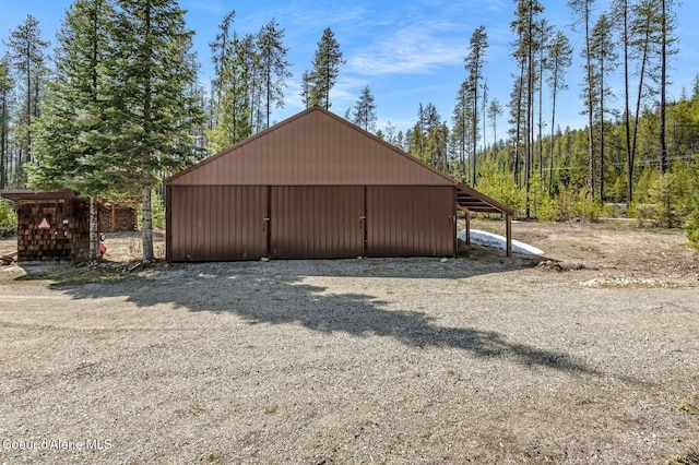762 Reeder Bay Rd, Nordman, ID 83848 - view of pole building featuring a view of trees