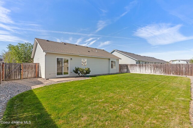 4905 W Lemonwood Ln, Post Falls, ID 83854 - rear view of property featuring a patio and a gate
