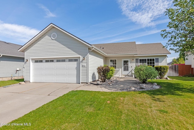 4905 W Lemonwood Ln, Post Falls, ID 83854 - ranch-style home featuring driveway and an attached garage