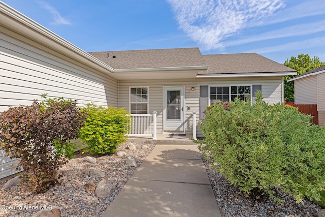 4905 W Lemonwood Ln, Post Falls, ID 83854 - doorway to property with roof with shingles