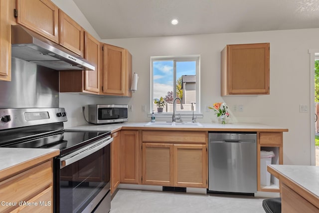 4905 W Lemonwood Ln, Post Falls, ID 83854 - kitchen featuring appliances with stainless steel finishes, range hood, a sink, light countertops, and recessed lighting