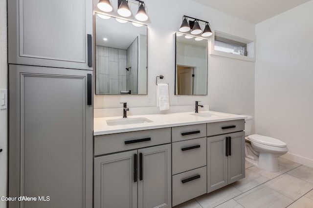 215 White Cloud Dr, Sandpoint, ID 83864 - full bath with toilet, tiled shower, and double vanity
