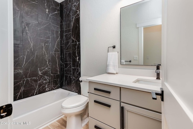 215 White Cloud Dr, Sandpoint, ID 83864 - full bath with toilet, wood finished floors, vanity, and washtub / shower combination