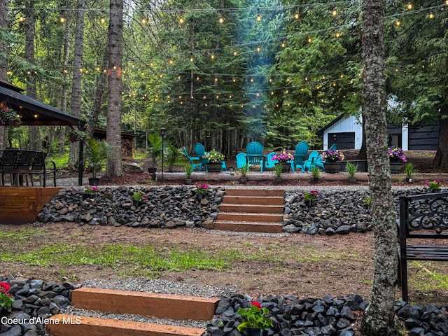 15818 N Morgan Ln, Hayden, ID 83835 - view of yard featuring an outbuilding and a patio area