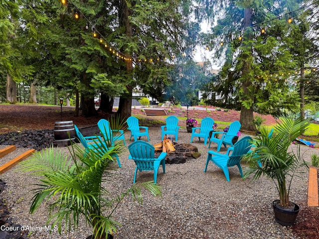 15818 N Morgan Ln, Hayden, ID 83835 - view of play area featuring a fire pit