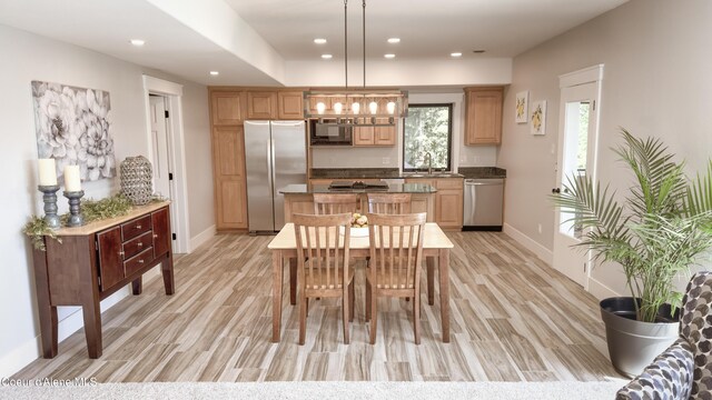 15818 N Morgan Ln, Hayden, ID 83835 - dining space with recessed lighting, light wood-style flooring, baseboards, and plenty of natural light