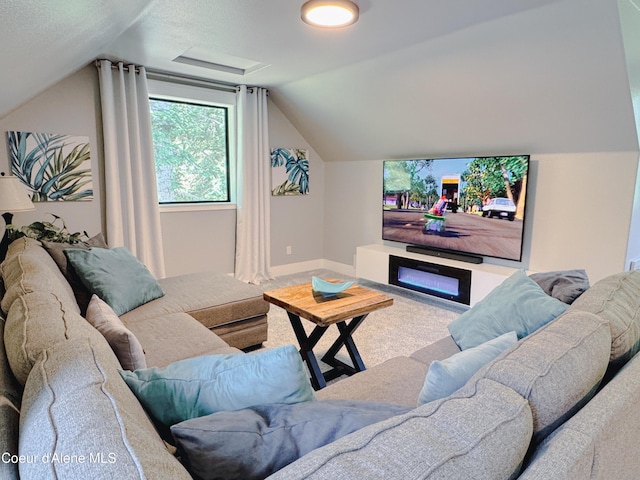 15818 N Morgan Ln, Hayden, ID 83835 - carpeted living area with lofted ceiling and baseboards