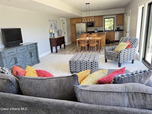 15818 N Morgan Ln, Hayden, ID 83835 - living room with baseboards and light wood finished floors