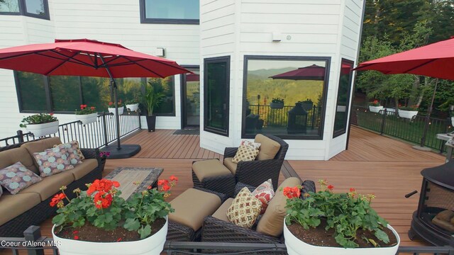 15818 N Morgan Ln, Hayden, ID 83835 - deck featuring an outdoor hangout area