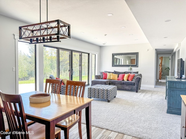 15818 N Morgan Ln, Hayden, ID 83835 - dining space with plenty of natural light, recessed lighting, light wood finished floors, and baseboards