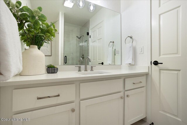 232 Pomrankey Ln, Dover, ID 83825 - full bath featuring a stall shower and vanity